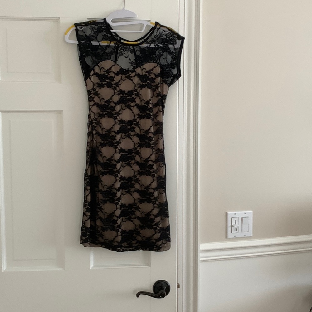 Black lace over nude underlay dress
